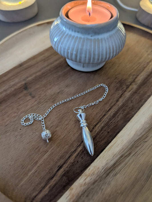 Pendule en laiton plaqué argent